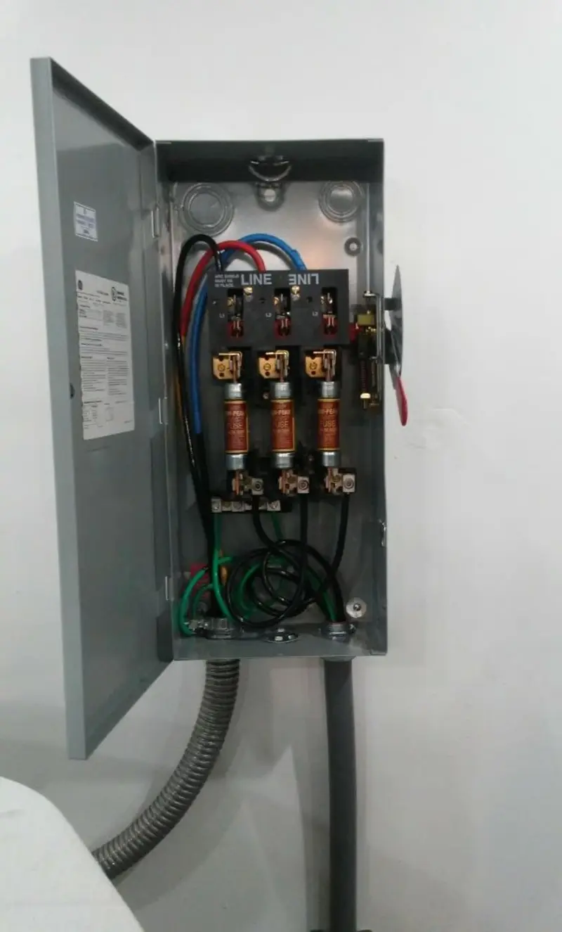 Three-phase disconnect switch installed for Smoke Detector Installation in Ojus